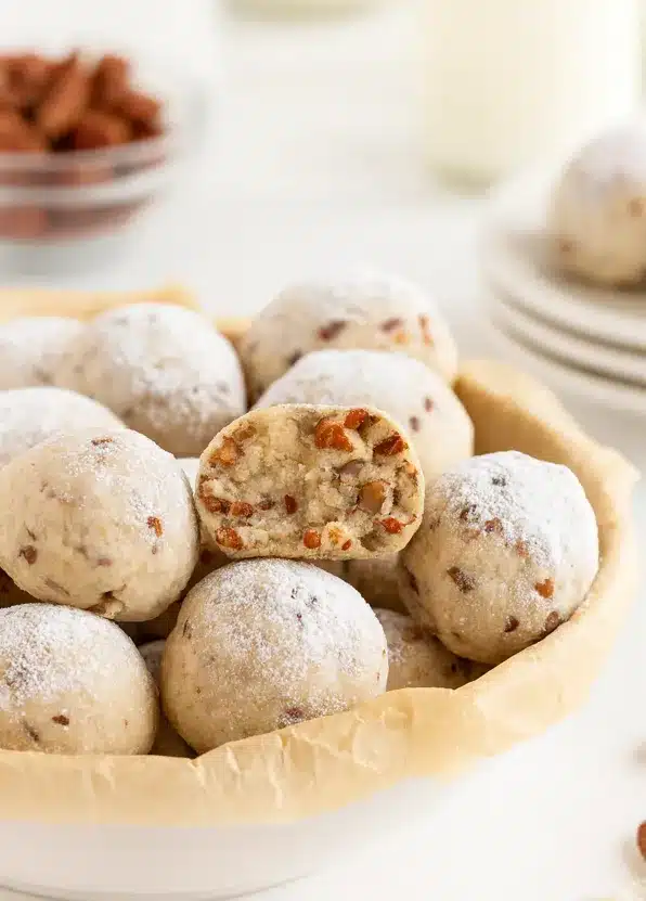 Christmas buttery pecan snowball cookies on white marble