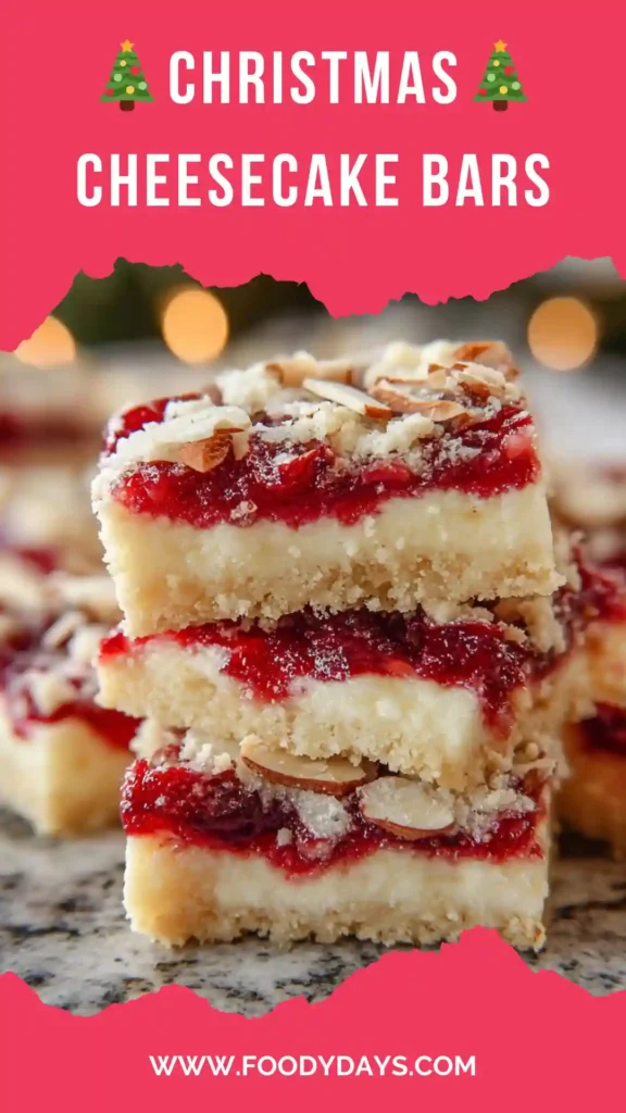 Modern Christmas cheesecake bars with vibrant cranberry swirl on white marble