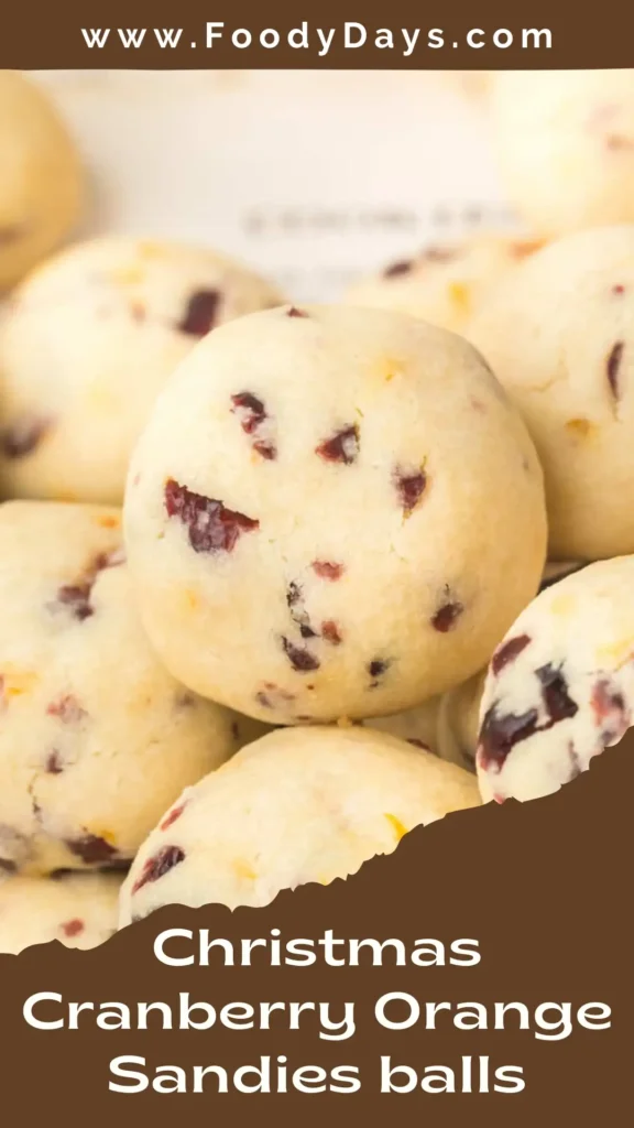 Christmas cranberry orange sandies balls served on festive plate