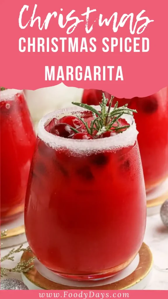 Christmas Spiced Margarita with rosemary and cranberry on a family table