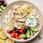 Slow Cooker Greek Chicken served warm with lemon and herbs for family dinner