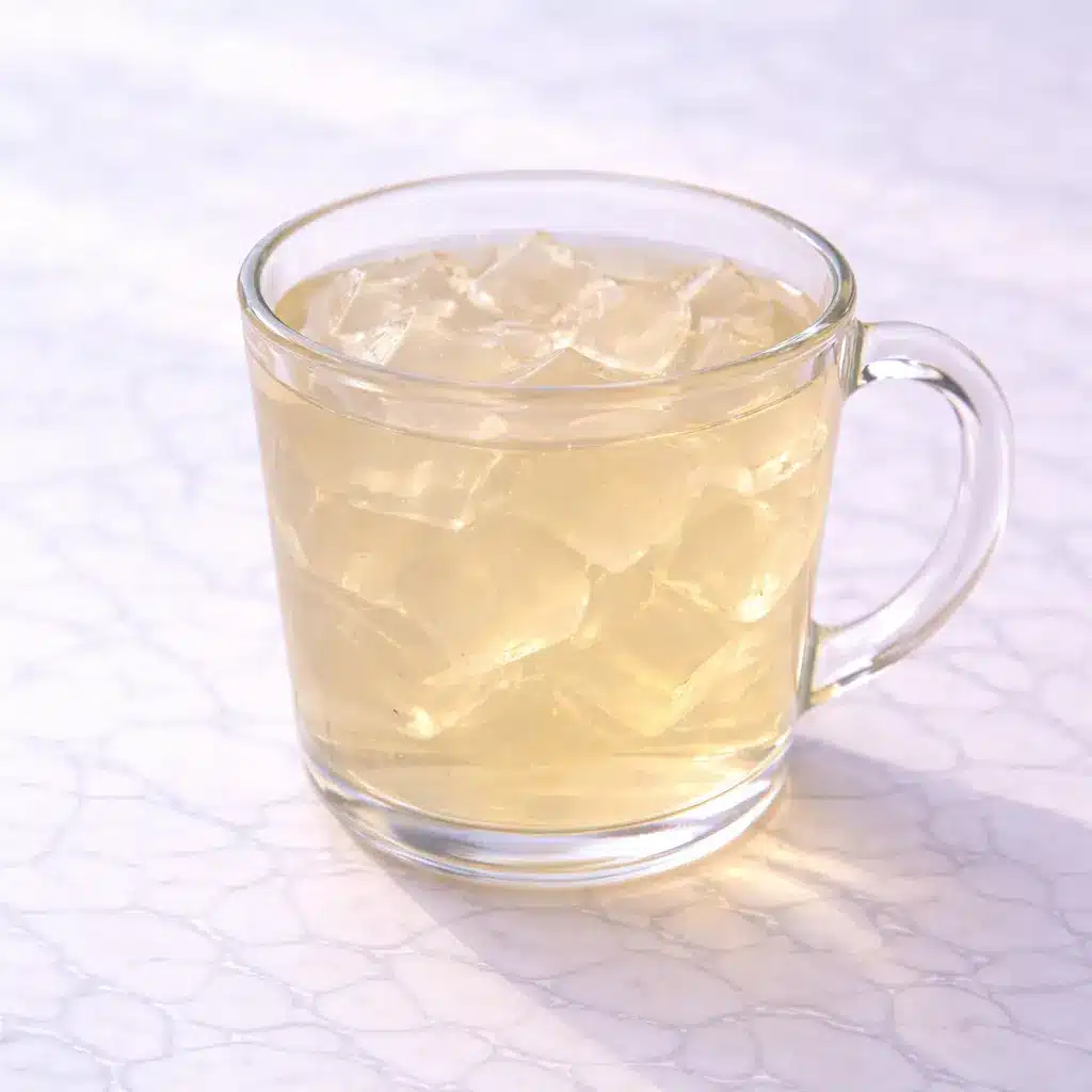 Jillian Michaels Gelatin Recipe cubes served in white bowl on marble surface