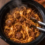 Creamy ribbon noodles with shredded chicken
